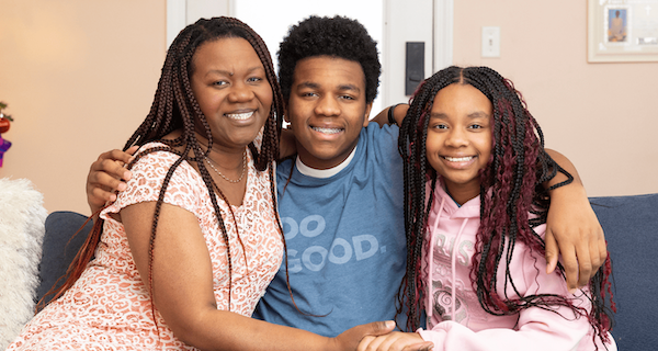 Family of three part of the Compass working capital program embracing