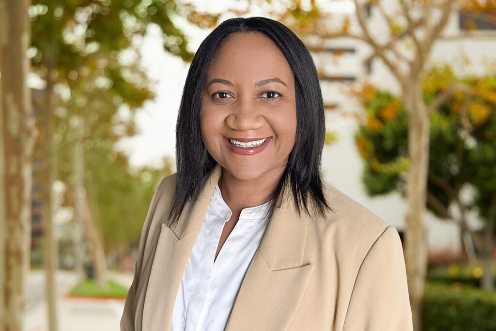 Photo of Shareea Woods on a forrest background